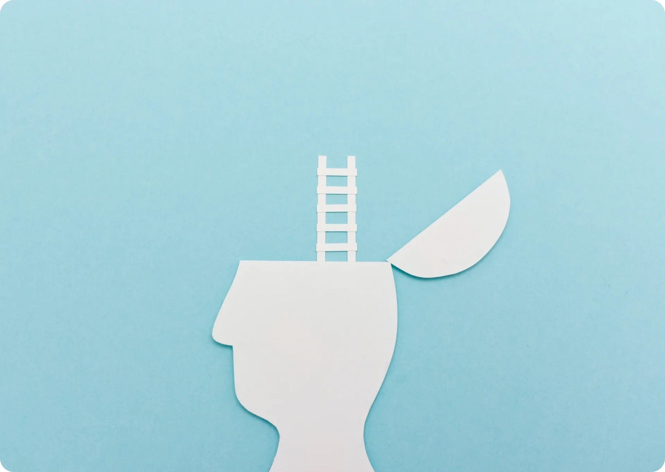 Silhouette of a head with an open top and ladder inside, against a light blue background.